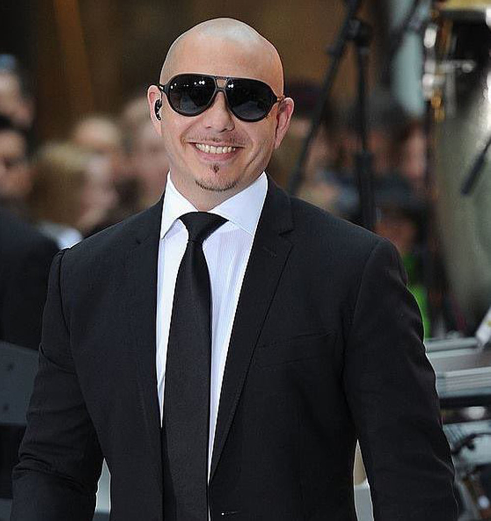 Pitbull Makes Film Composing Debut With John Travolta's 'Gotti